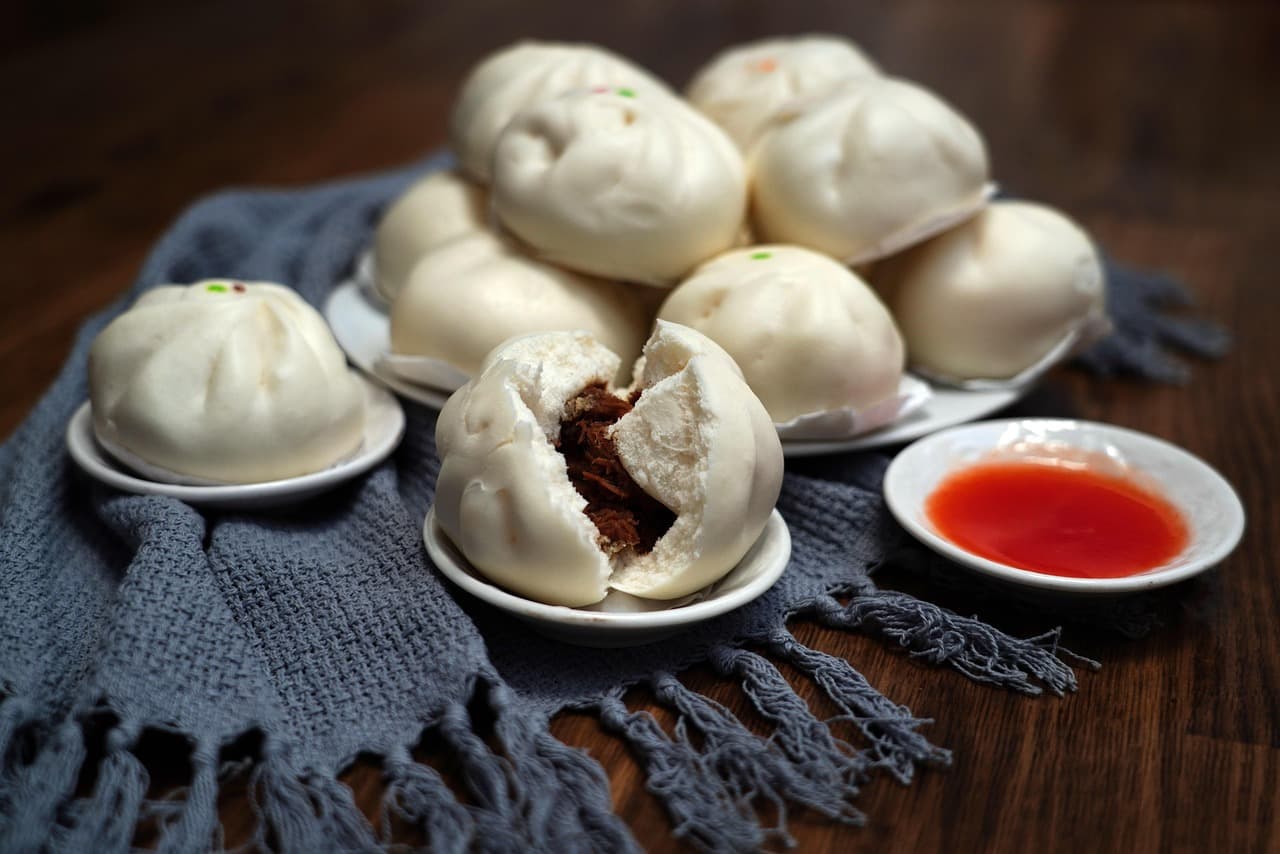 Bao buns with chilli sauce for a Melbourne bao catering party table.